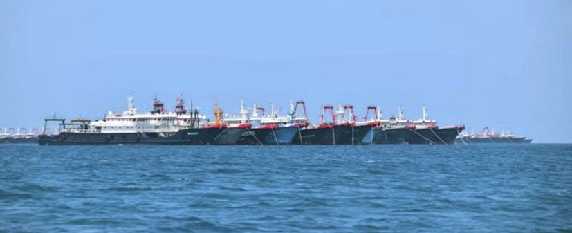 An image captured on 7 March showing some of the Chinese fishing vessels moored near the disputed Whitsun Reef in the Spratly island chain. (NTF-WPS)