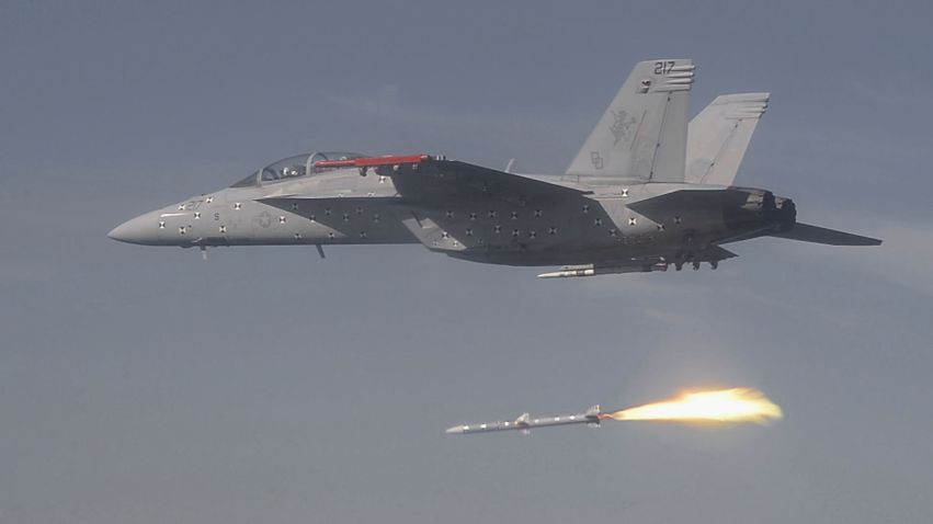 A US Navy F/A-18F Super Hornet multirole combat aircraft testbed launches an AIM-120D-3 AMRAAM variant over Naval Air Station Point Mugu, California on 12 May in the second live-fire test of the missile. ( US Navy)